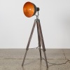 An Industrial-Style Tripod Lamp with an Edison Bulb