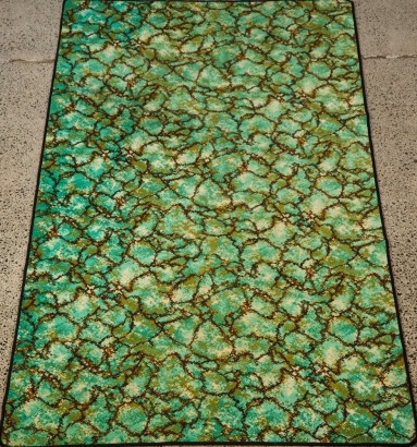 A Large Vintage Turquoise and Brown Marbled Floor Rug
