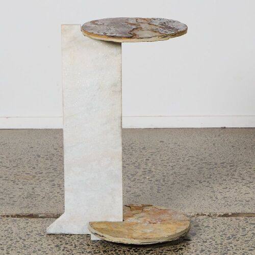 An Oxmonts Round Reach End Table