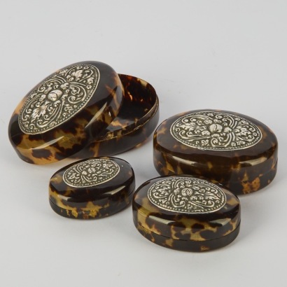 A Collection of Nesting Tortoise Shell Trinket Boxes