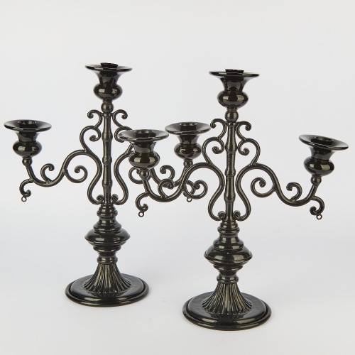 A Tall Pair of Antique-Style Black Metal Candelabra