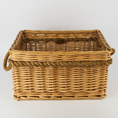 A Woven Wicker Storage Basket with Rope Handles