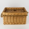 A Woven Wicker Storage Basket with Rope Handles