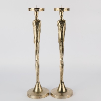 A Pair of Tall figure Candlesticks
