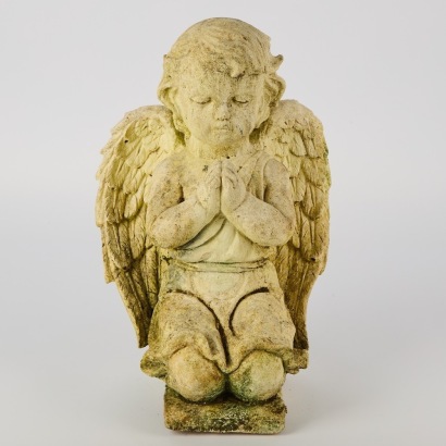 A Concrete Cherub Garden Sculpture