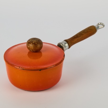 A Vibrant Orange Cast Iron Saucepan and Lid