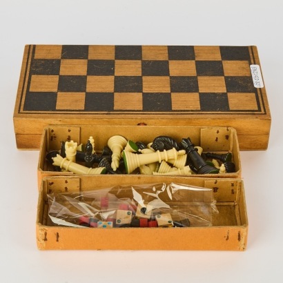 A Combination Chess and Backgammon Set Complete with Folding Board