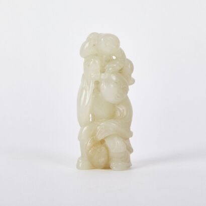 A Chinese Qing Dynasty Carved Hetian Jade Figure