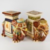 A Pairing of Porcelain Elephant Flower Stands