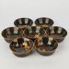 A Group of Seven Japanese Early to Mid 20 Century Black Lacquer Gilt Floral Bowls