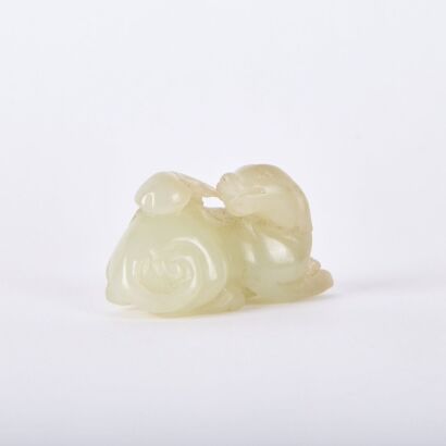 A Chinese Ming&ndash;Qing Dynasty Carved Hetian Jade Mythical Beast
