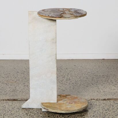 An Oxmonts Round Reach End Table