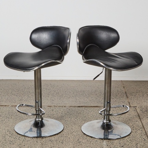 A Pair of Saddle-Seat Bar Stools