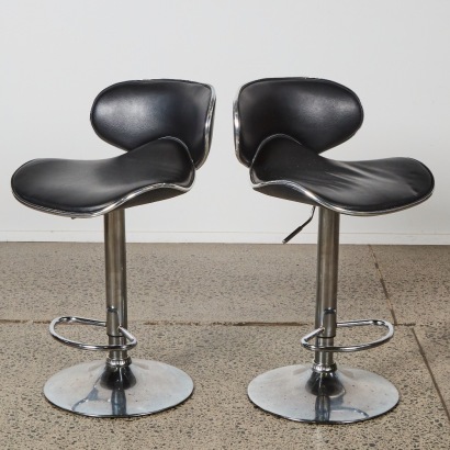 A Pair of Saddle-Seat Bar Stools