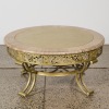 A Wrought Iron and Marble Table