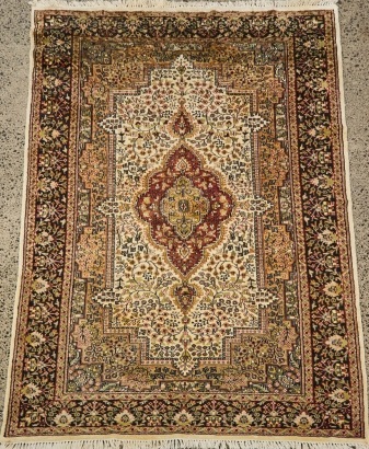 A Vintage Wool and Silk Persian Rug