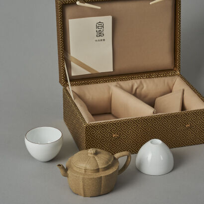 A Chinese Yellow Clay Teapot (marks on lid and base) and Two White Glazed Tea Cups