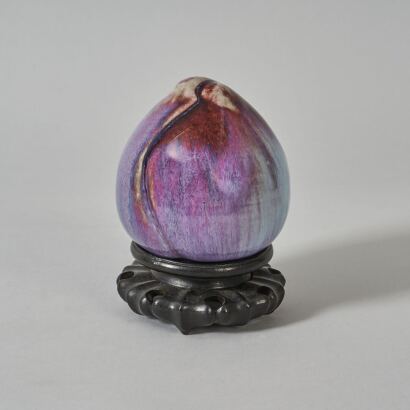 A Chinese Jun 'Peach' Ornament (Qianlong Nian Zhi Mark)