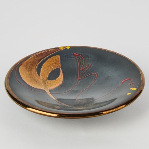 A Peter COllis Plate with Hand Painted Designs