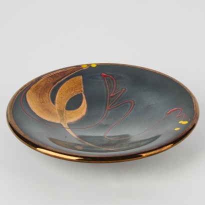 A Peter COllis Plate with Hand Painted Designs