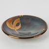 A Peter COllis Plate with Hand Painted Designs