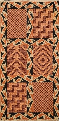 A Feltex Rug with Maori Motif