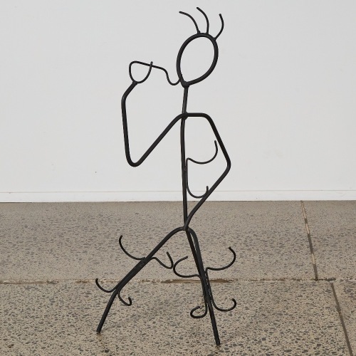 A Wrought Iron Figure Wine Bottle Holder