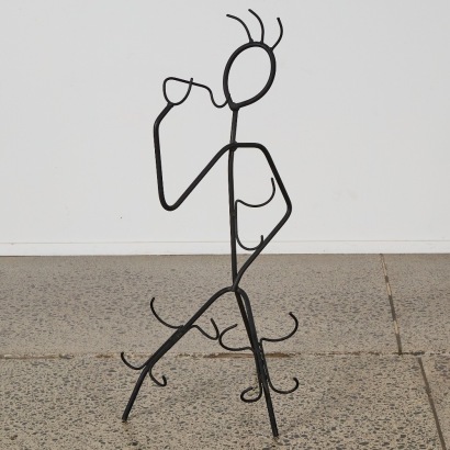 A Wrought Iron Figure Wine Bottle Holder