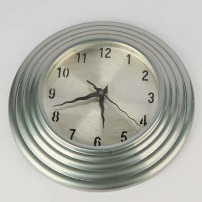 A Wiggly Handed Post Modern Style Wall Clock with Ribbed Egde