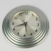 A Wiggly Handed Post Modern Style Wall Clock with Ribbed Egde
