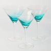 A Set of Three Ice Blue Martini Glasses