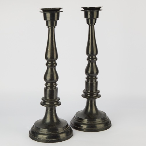 A Pair of Large Black Metal Column Candleholders