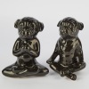 A Pair of Black Ceramic Zen Pug Dog Statues