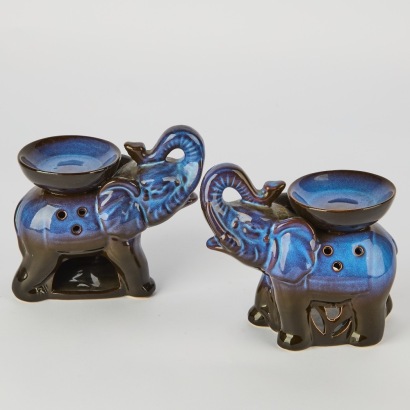 A Pair of Ceramic Elephant Candle Holder Scent Burners