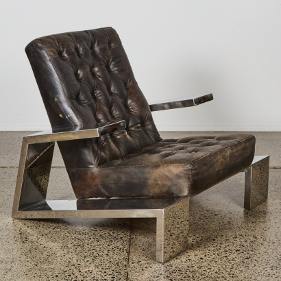 An Elephant Style Leather Armchair