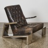 An Elephant Style Leather Armchair