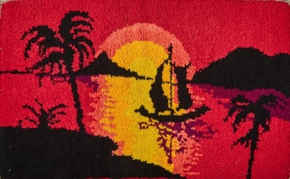 A Rug Depicting a Beach at Sunset