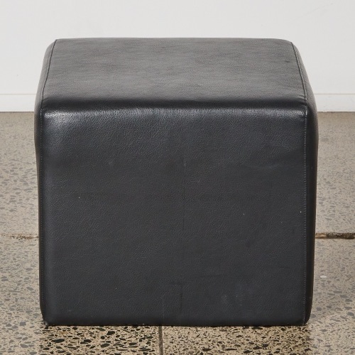 A Black Leather Foot Stool