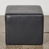 A Black Leather Foot Stool