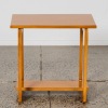 A Solid Rimu Sleigh Based Table - 2