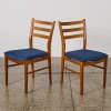A Pair Of Teak Mid-Century Ladder Back Chairs