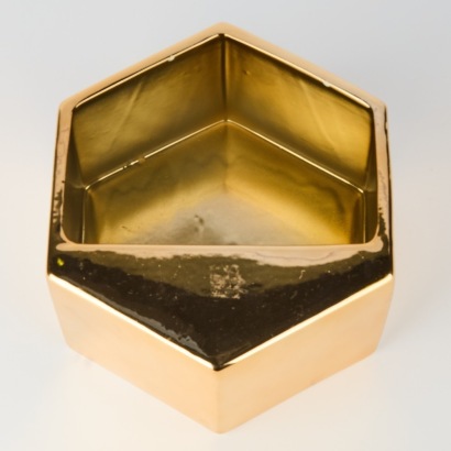 A Gold Geometric Ceramic Wall Storage Unit