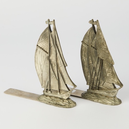 A Pair of Pewter Sailing Ship Bookends