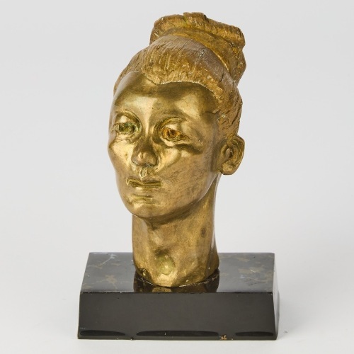 A Solid Bronze Head Sculpture