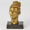 A Solid Bronze Head Sculpture