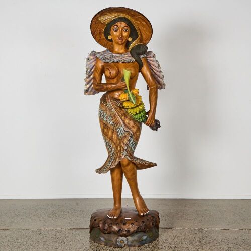 An Indonesian Painted Wood Figure