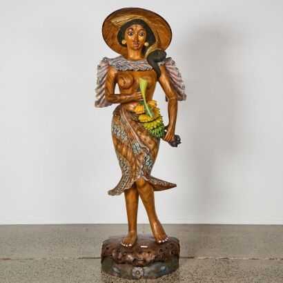 An Indonesian Painted Wood Figure