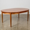 A Round Mid-Century Extending Dining Table