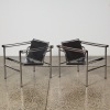 A Pair of Le Corbusier Basculant-Style Chairs