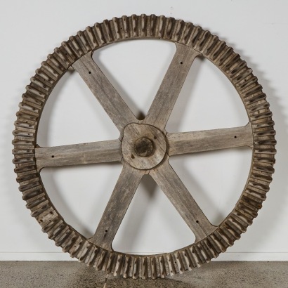 An Antique Industrial Wooden Factory Wheel